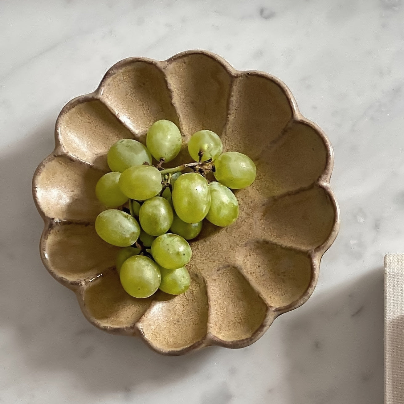 Rinka Plate 17cm with grapes, handcrafted porcelain by Kaneko Kohyo, showcasing elegant craftsmanship on a marble table.