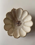 Porcelain Rinka Bowl 12cm with floral design by Kaneko Kohyo, featuring a delicate necklace resting inside, perfect for table setting.