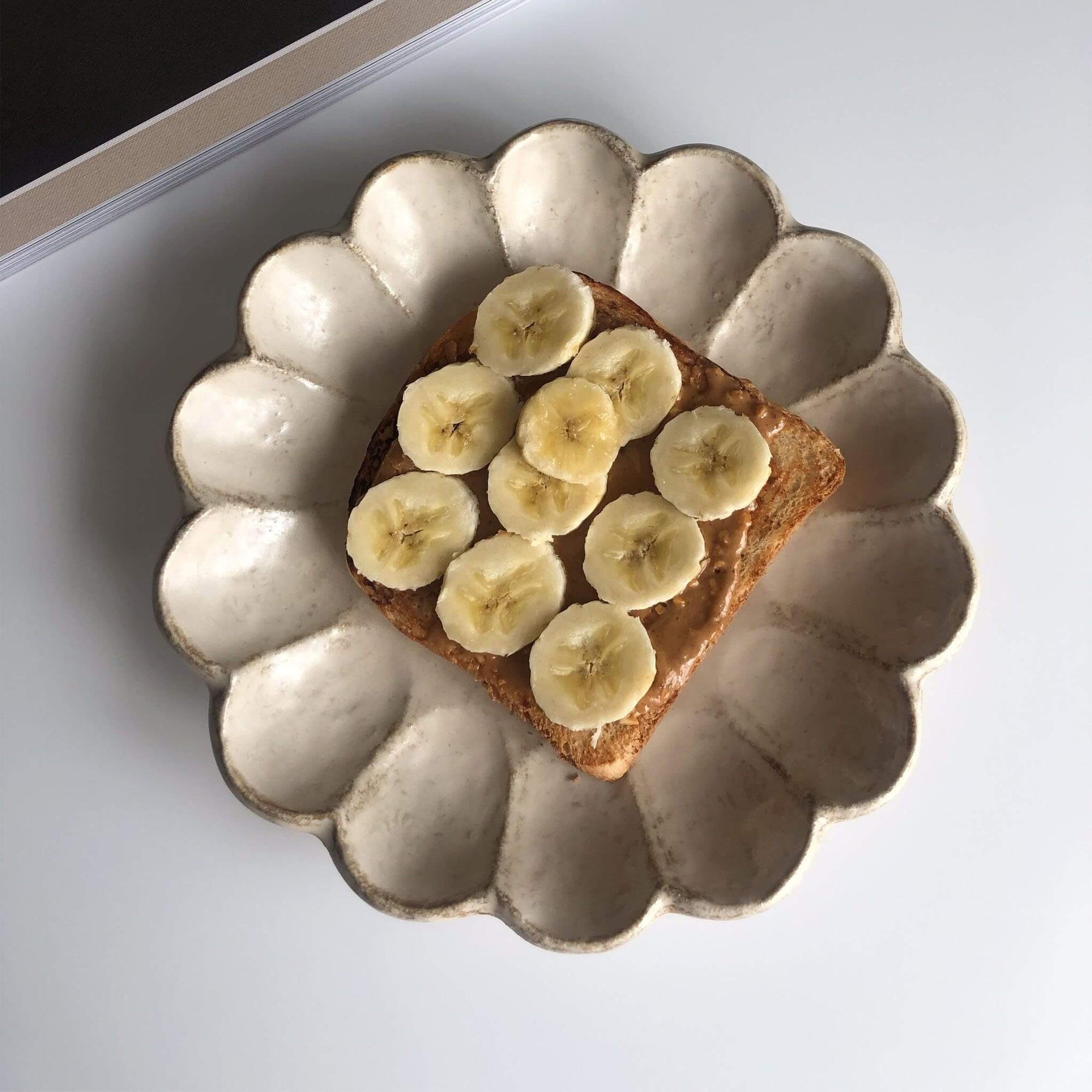 Rinka Plate by Kaneko Kohyo with banana toast, handmade in Japan, microwave and dishwasher safe, unique glaze texture.