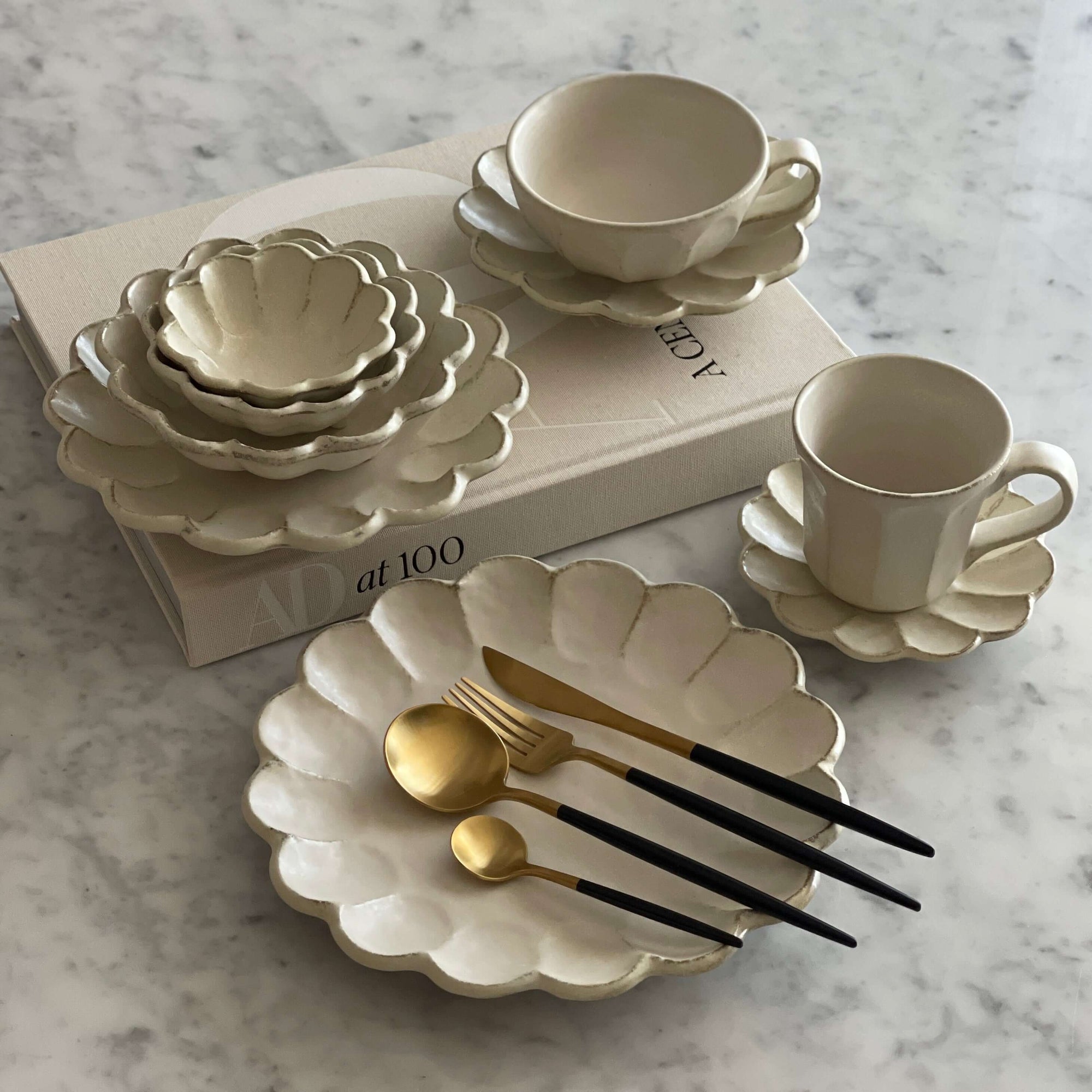 Elegant Rinka Bundle 2 dinnerware set with flower petal design, showcasing handcrafted Japanese and Western style fusion on marble surface.