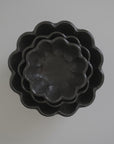 Rinka Bowls by Kaneko Kohyo, handmade in Japan, microwave and dishwasher safe, unique glaze, stack of scalloped bowls.