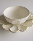 Elegant white Rinka soup cup by Kaneko Kohyo, crafted from delicate porcelain with a flower shape, perfect for enhancing any table setting.