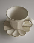 Rinka Mug & Plate Set in porcelain, featuring a uniquely textured glaze, handmade in Japan. Microwave and dishwasher safe.