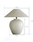 Medium egg-shaped clay pot table lamp with linen shade, measuring 500mm in diameter and height, pottery-inspired design.