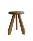 Meribel Stool crafted from imported teak wood, inspired by Alpine architecture, featuring manual polishing and charcoal burning finish.