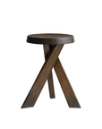 Meribel Stool in solid teak wood, inspired by Alpine architecture, featuring a rustic finish with manual polishing and charcoal burning.