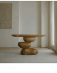 Wabi-Sabi wood table with irregular structure in a retro style living room, showcasing natural aging and balancing life elements.