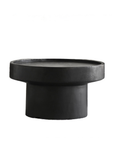 Black Seal Coffee Table with natural log texture and elegant design, perfect for creating an atmospheric space.