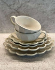 Elegant afternoon tea set featuring two soup cups and three white rinka plates, perfect for a refined dining experience.