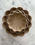 Rinka Bowl Set of Three in Delicate Porcelain with Flower Shape, Handcrafted by Kaneko Kohyo, Displayed on Marble Surface