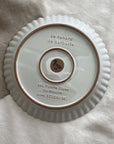 Marumitsu Barbarie plate base, featuring pottery material details and French text on a textured surface.
