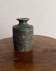 Shabby Chic Green Vase from Yoshida Pottery Collection, designed by Masakazu Yoshida, on a wooden table.