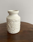 Yoshida White Vase from the Yoshida Pottery Collection, showcasing elegant texture and artisanal craftsmanship on a wooden table.