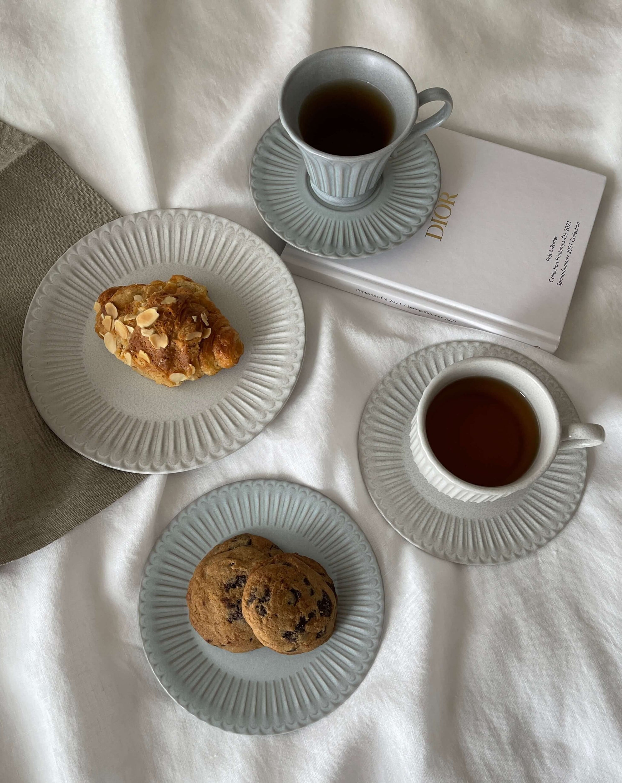 Storia coffee cup & saucer set with cookies and pastry, featuring European-inspired design and intricate detailing on porcelain.