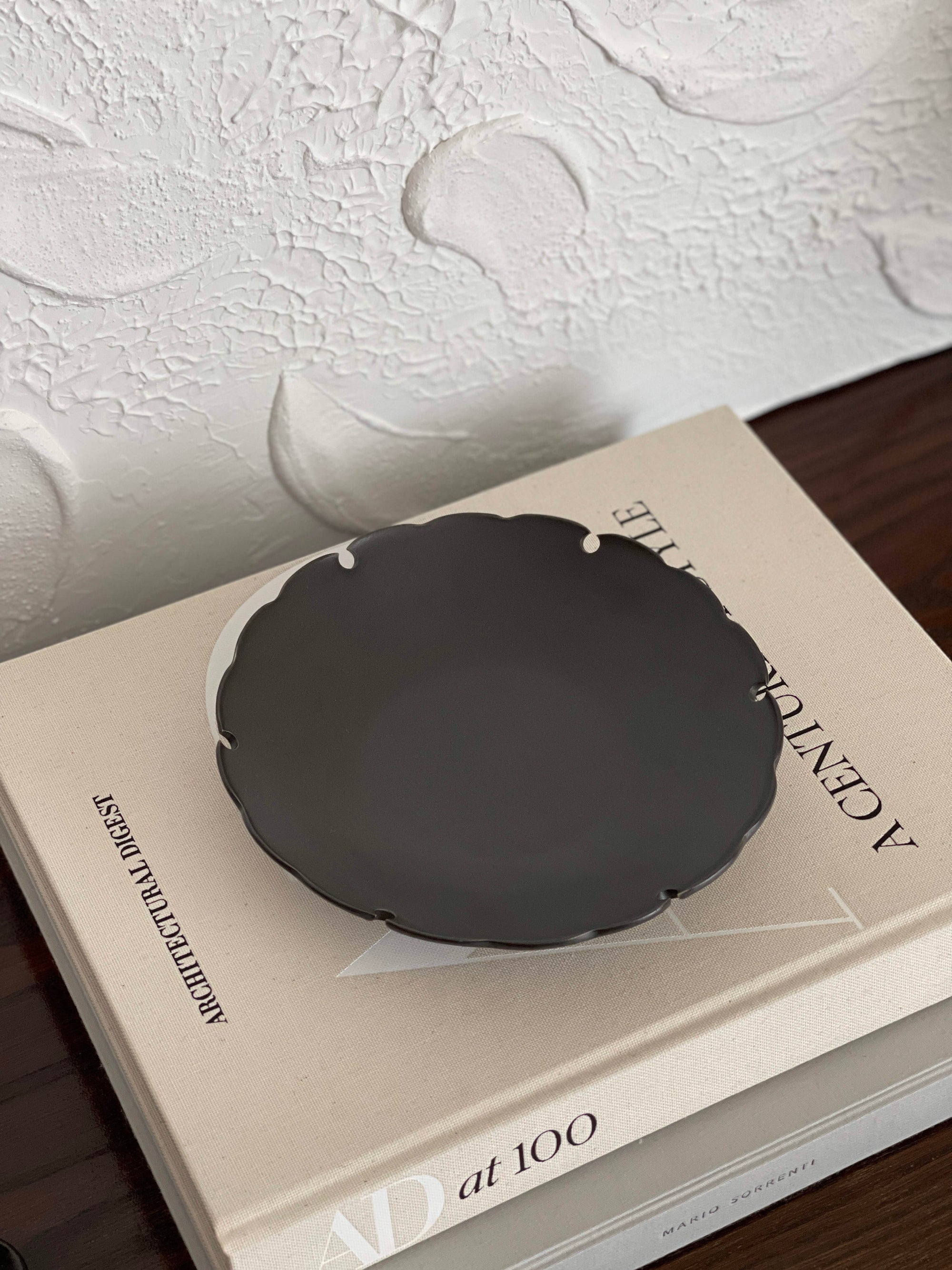 Elegant Yukiwa Plate by Yoshida Pottery on a table, showcasing its nature-inspired design and sophisticated charm.