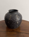 Shabby Chic Black Vase from Yoshida Pottery Collection by Masakazu Yoshida on wooden table, featuring nature-inspired patterns.