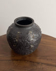 Shabby Chic Black Vase from Yoshida Pottery Collection with nature-inspired patterns on a wooden table. Elegant home decor piece.