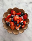 Rinka Bowl by Kaneko Kohyo filled with fresh strawberries and blueberries on a marble surface, showcasing handmade craftsmanship.
