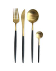 Elegant matte black and gold flatware set, including fork, knife, spoon, and teaspoon, perfect for modern dining.