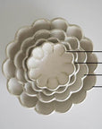 Rinka Bowls by Kaneko Kohyo in various sizes 10cm, 12cm, 16cm, 21cm, stacked in a floral shape, handmade in Japan.