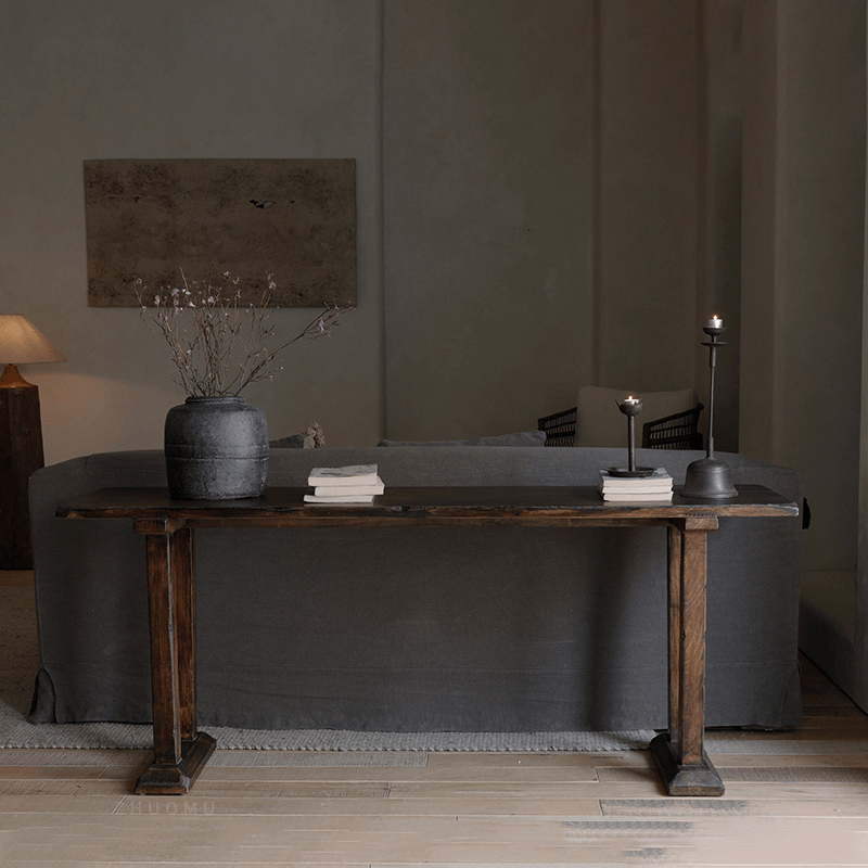 Chinese-style entrance table made from natural elm wood, showcasing natural wood grain and minimalistic design in a modern living room.