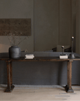 Chinese-style entrance table made from natural elm wood, showcasing natural wood grain and minimalistic design in a modern living room.