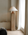 Elegant Stake Floor Lamp with linen shade and rustic wood base, featuring a dimmable switch for customizable cozy lighting.