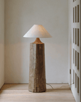 Rustic Stake Floor Lamp with linen shade and dimmable old wood base for cozy, mood-enhancing lighting in modern interiors.