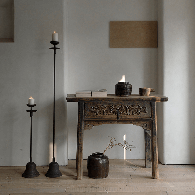Antique Aimu Floor Candle Holder with Distressed Finish in Rustic Home Décor Setting