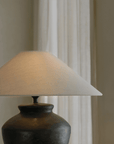 Modern Pottery Clay Pot Lamp with Linen Lampshade on Table