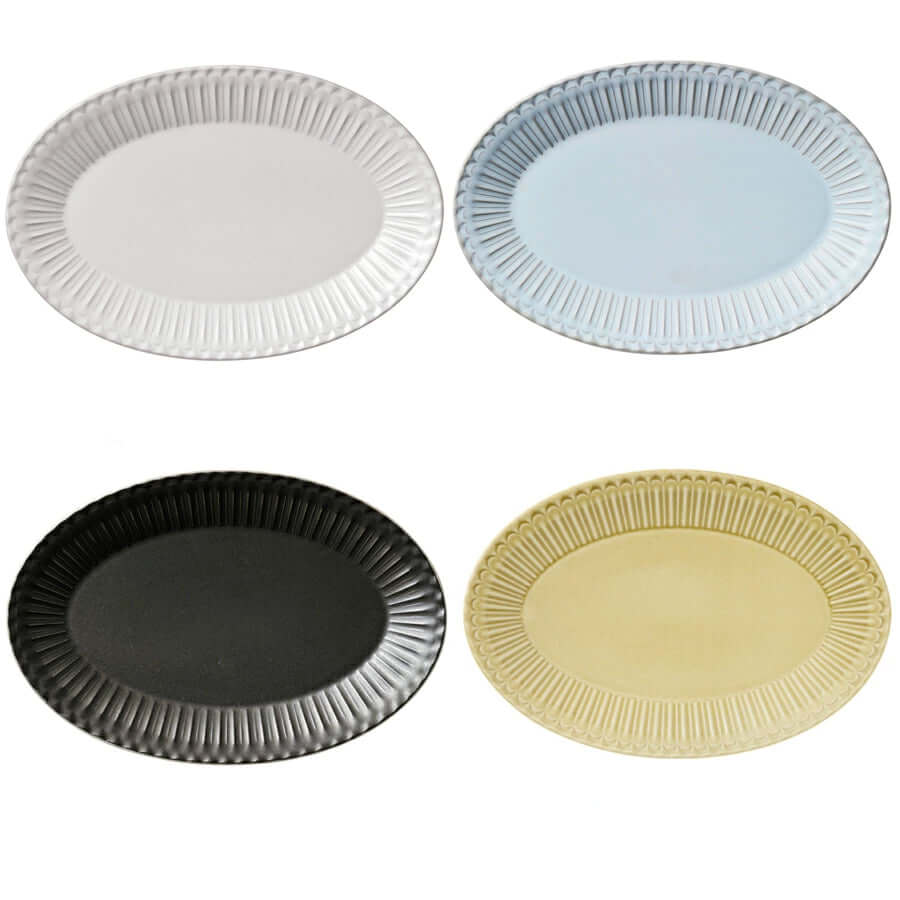 Storia Oval Plates in various colors, showcasing elegant porcelain design with antique finish, 32cm, perfect for nostalgic dining.
