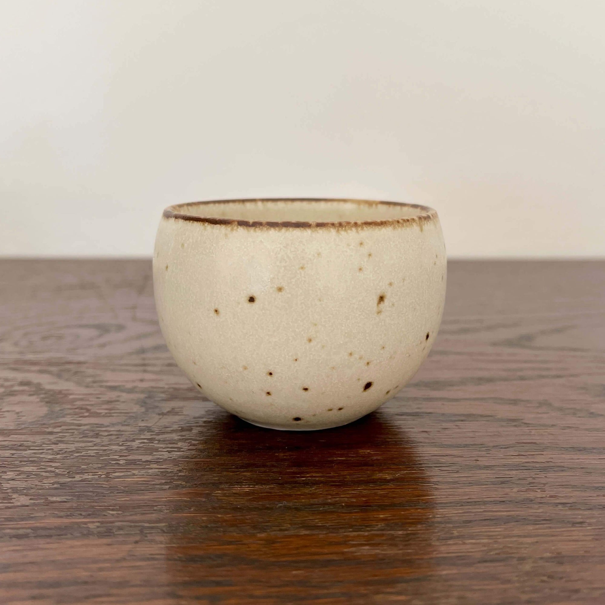Rila Tea Cup by Minowares, featuring a warm matte color and textured design, perfect for tea or single-serve desserts.