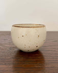 Rila Tea Cup by Minowares, featuring a warm matte color and textured design, perfect for tea or single-serve desserts.