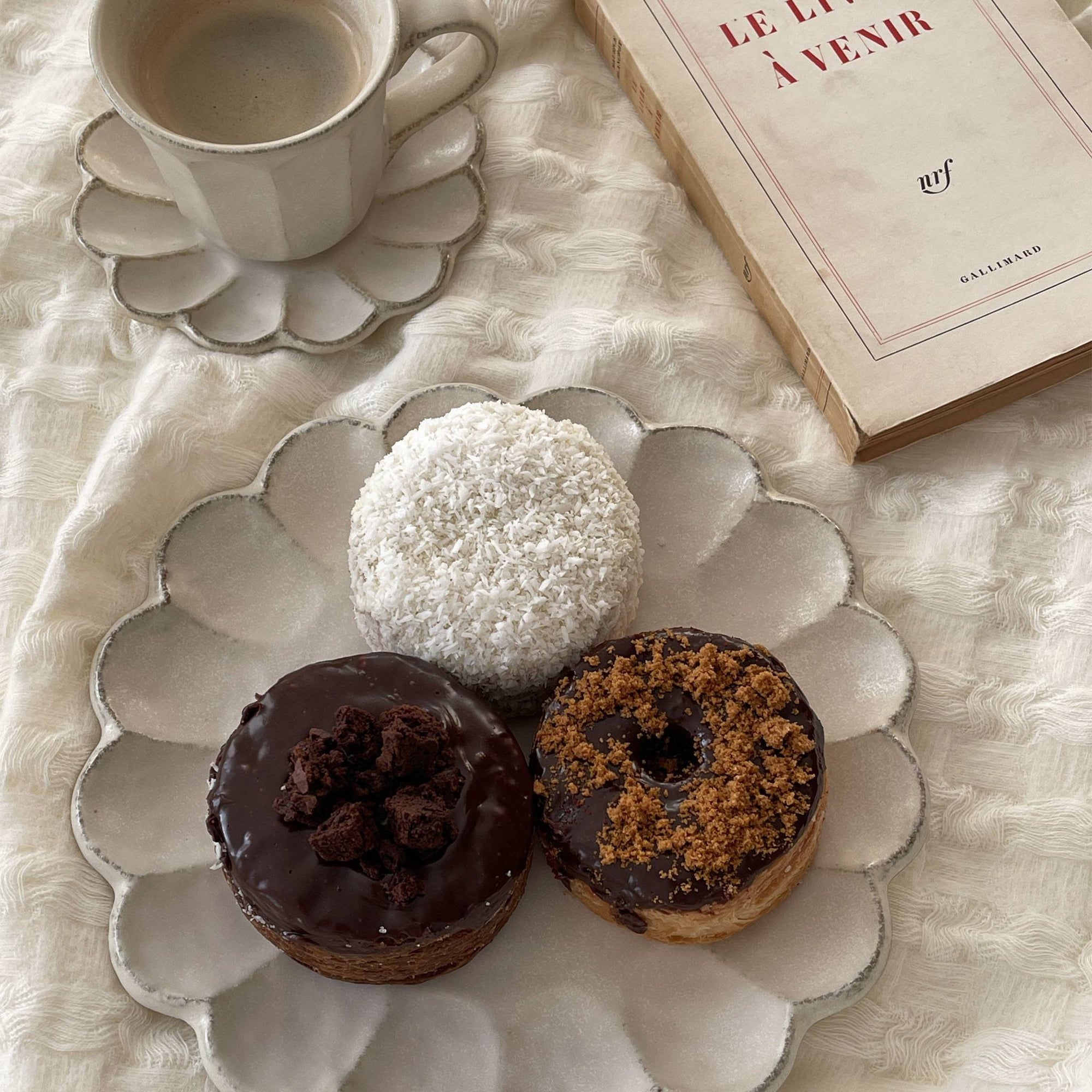 Elegant Rinka Plate with Assorted Donuts and Coffee Styled with Book and Rug