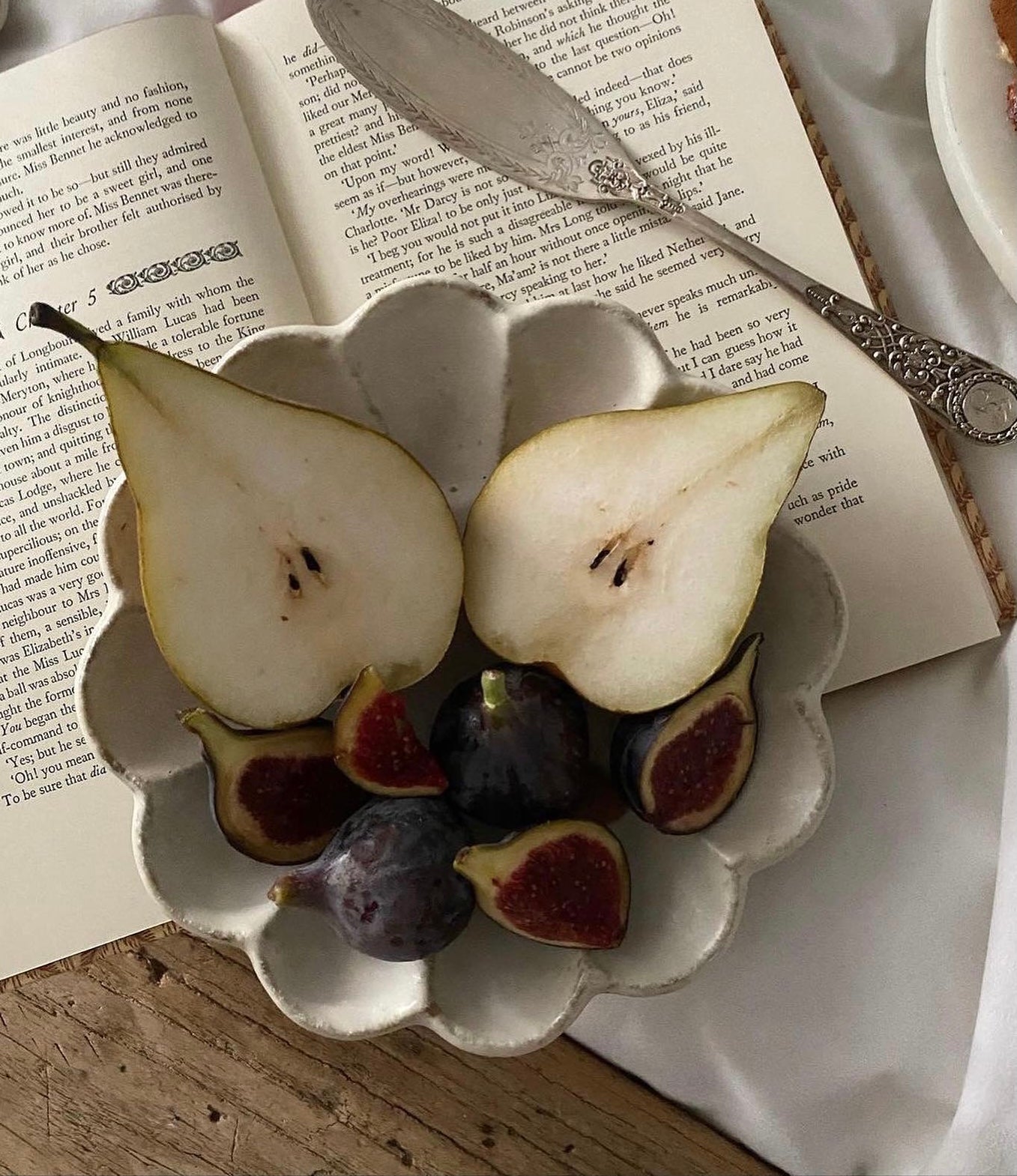 Rinka Bowl 16cm by Kaneko Kohyo with fruit, showcasing delicate porcelain and elegant flower design, perfect for enhancing table settings.