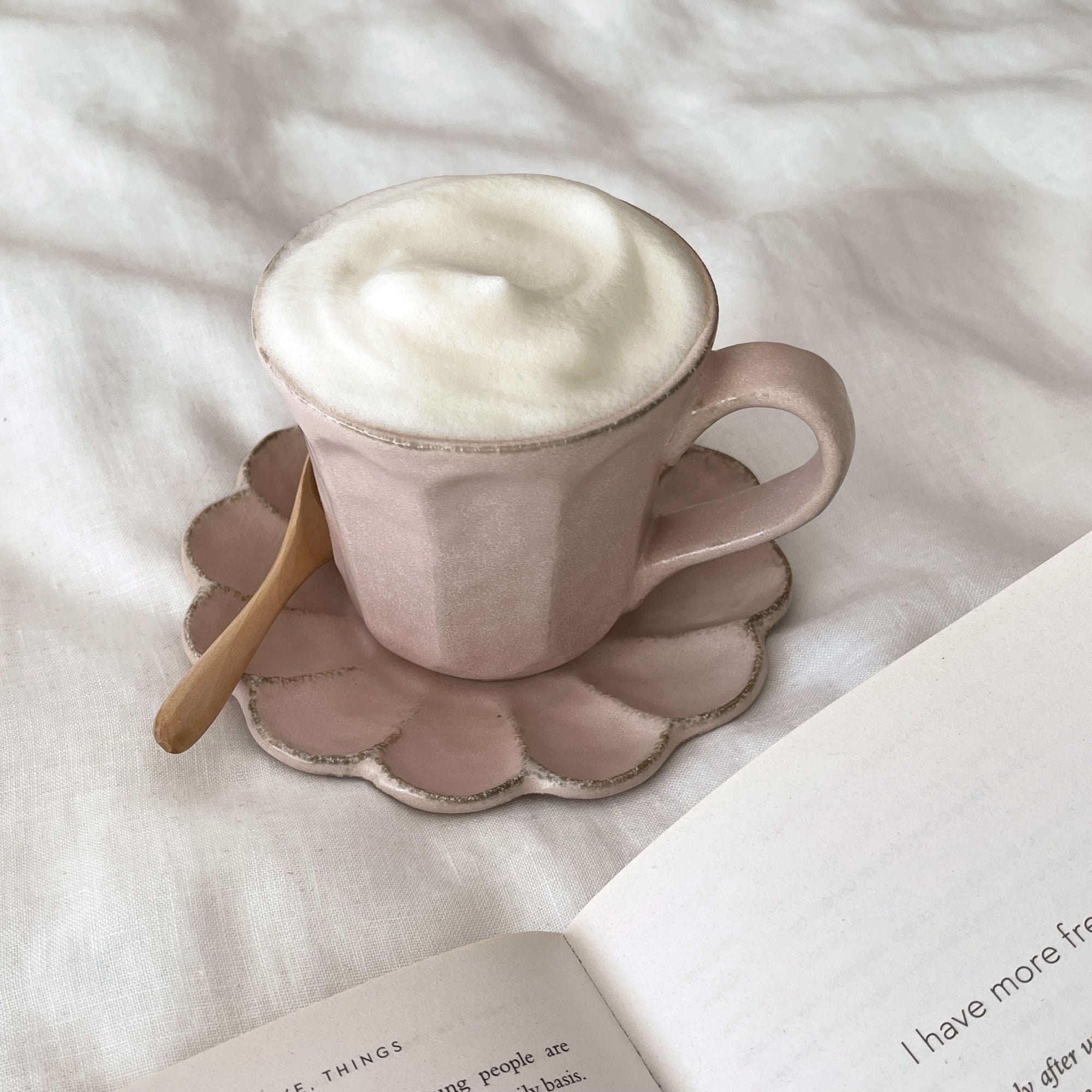 Rinka Mug & Plate Set with frothy beverage, includes pink porcelain mug and matching scalloped plate, on a soft white background.