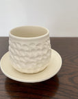 Shinogi Cup and Saucer Set by Masakazu Yoshida, featuring nature-inspired patterns, elegant and refreshing Yoshida Pottery Collection.