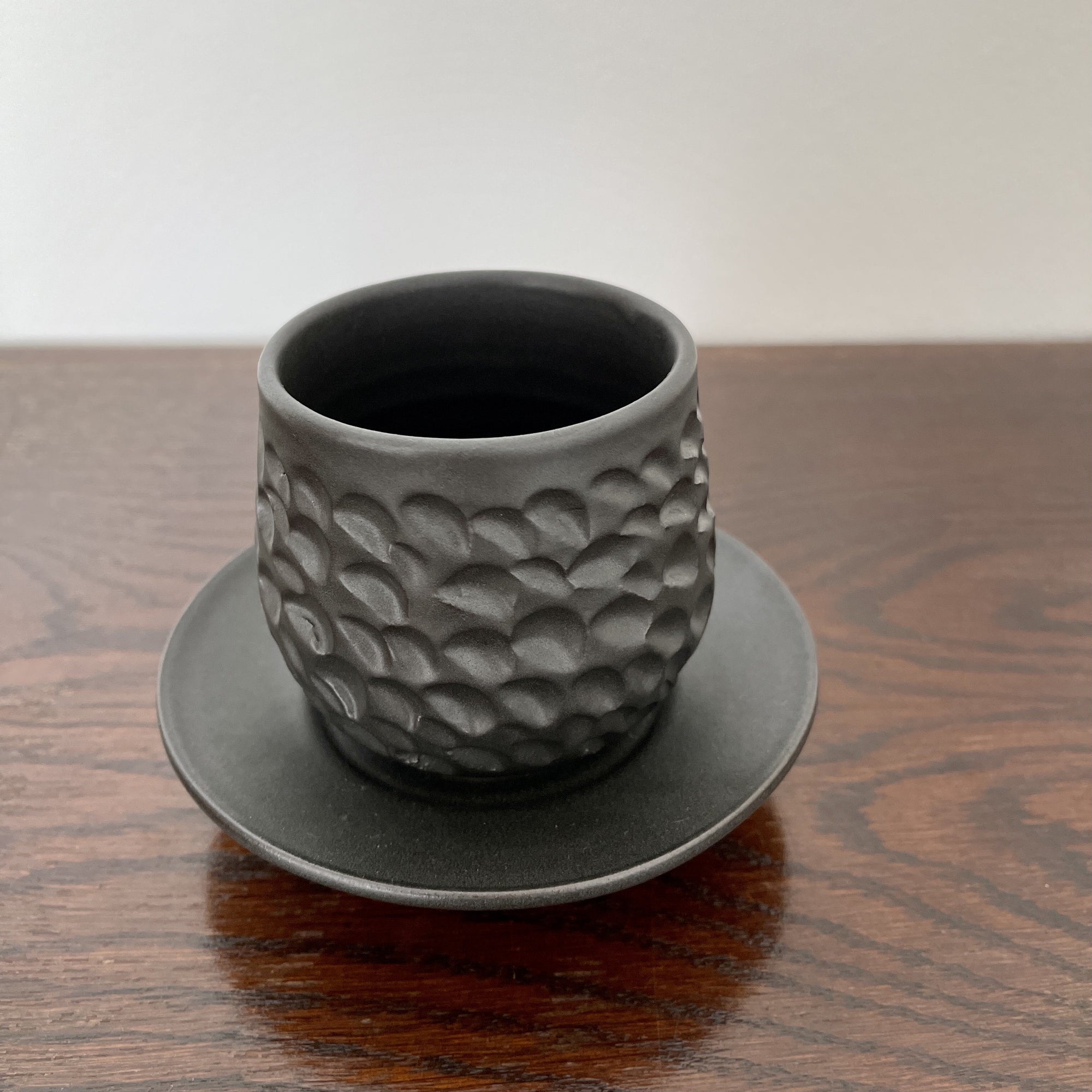 Elegant Yoshida Pottery Shinogi Cup and Saucer with nature-inspired patterns, crafted by ceramist Masakazu Yoshida.