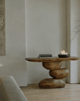 Wabi-Sabi living room porch table with irregular wood structure and candles, showcasing a retro nostalgic design with natural elements.