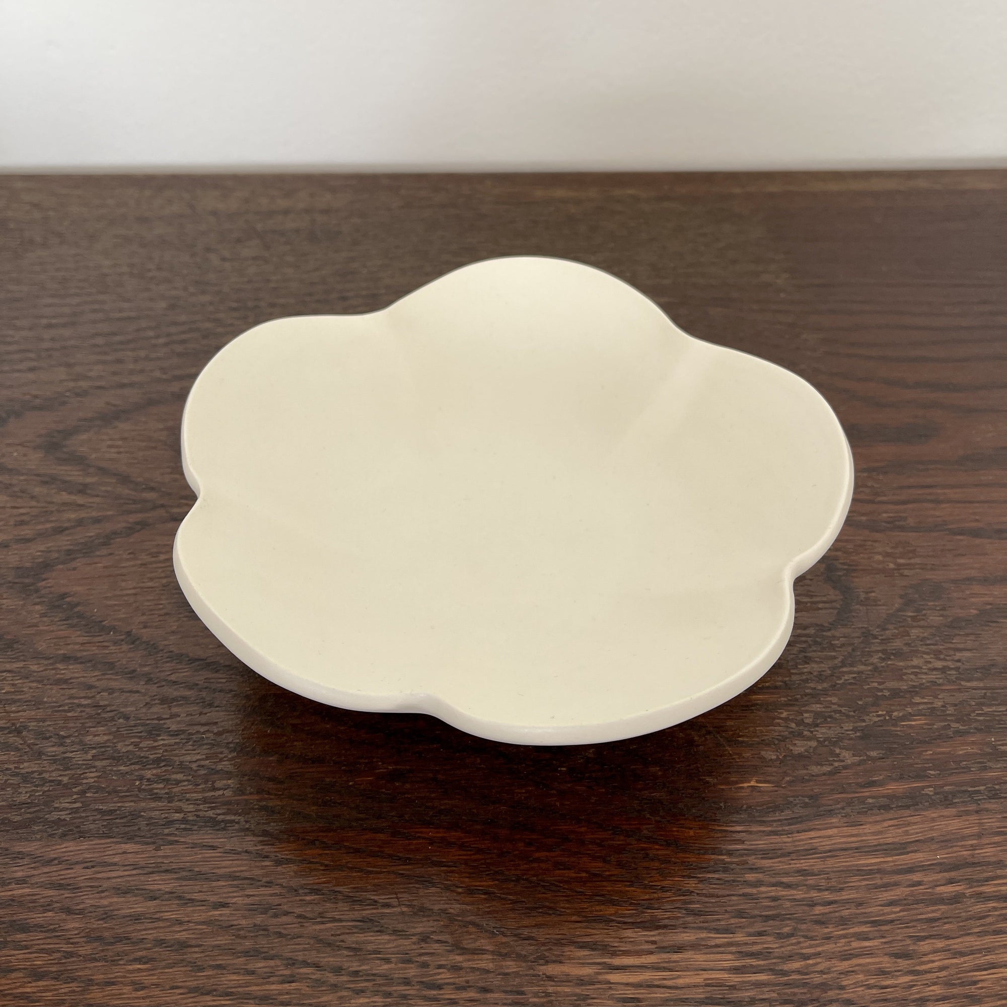 UME Bowl from Yoshida Pottery Collection by Masakazu Yoshida, featuring nature-inspired design on a dark wooden table.
