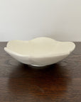 Elegant UME bowl from Yoshida Pottery Collection by Masakazu Yoshida, showcasing nature-inspired design on a wooden table.