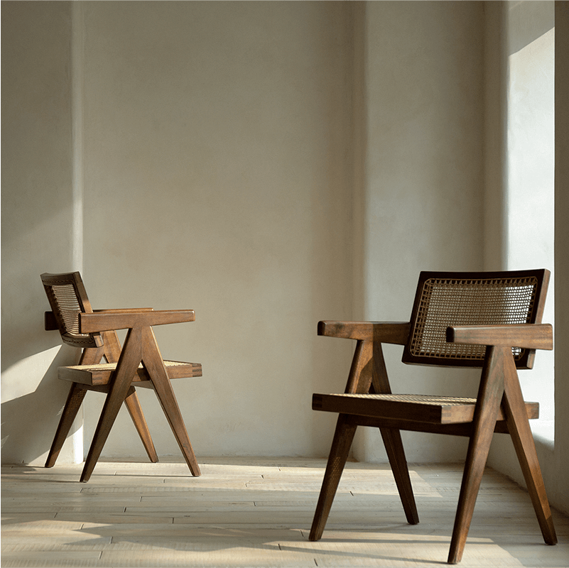 Chandigarh chairs in teak and rattan showcasing wabi-sabi design and Western minimalism for a peaceful, romantic ambiance.