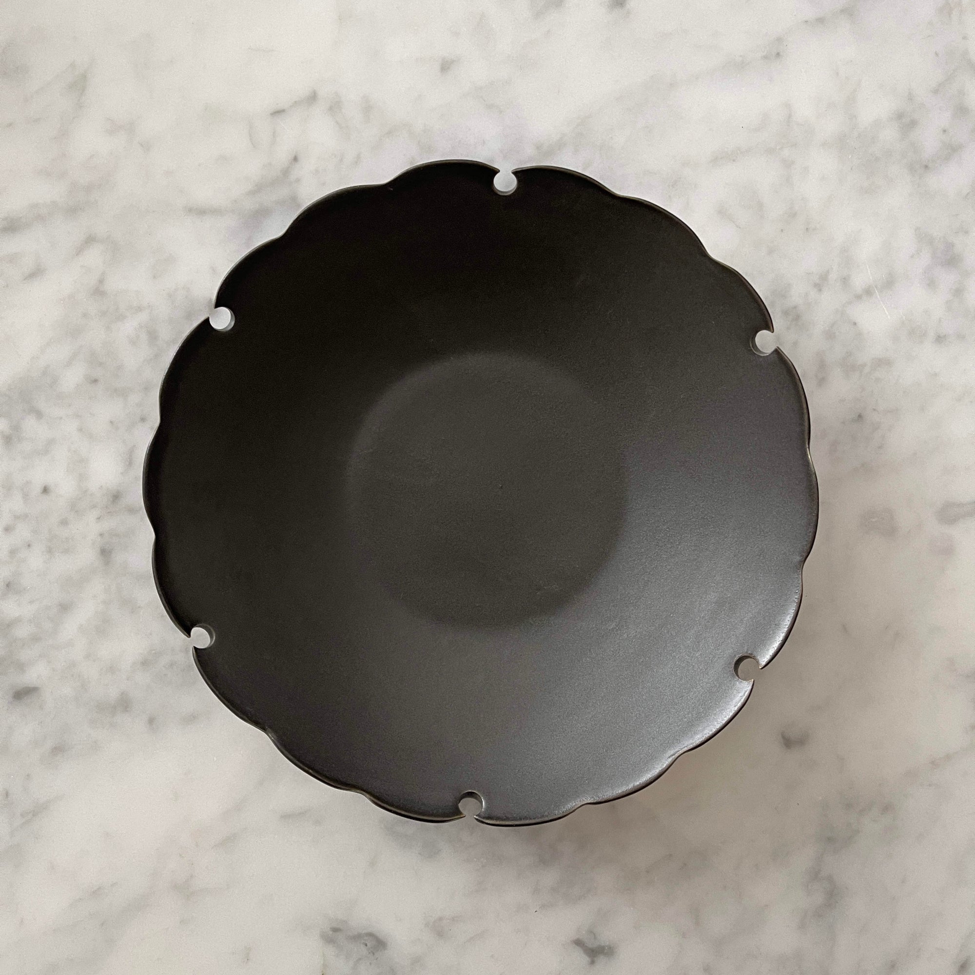 Elegant Yukiwa Plate by Yoshida Pottery with nature-inspired design, adding sophistication to any table setting.