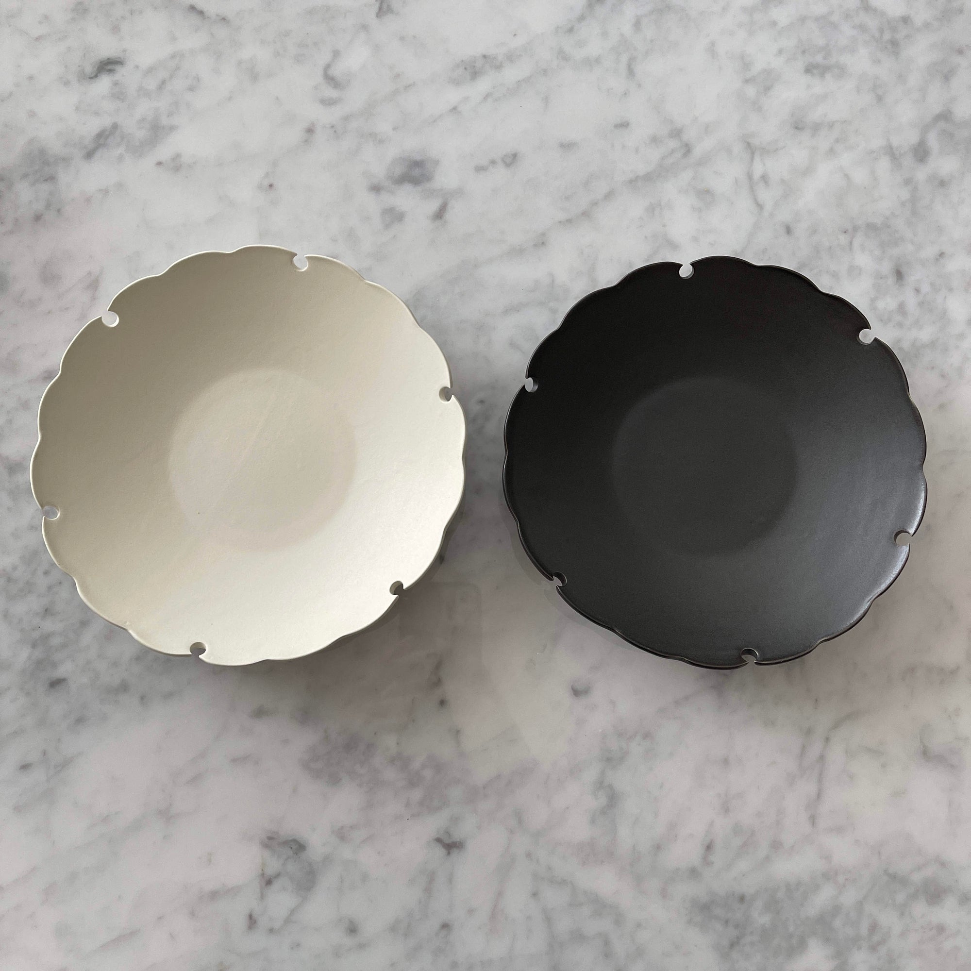 Elegant Yukiwa Plate by Yoshida Pottery with nature-inspired patterns, ideal for adding a sophisticated touch to any table setting.