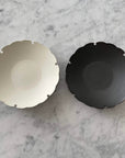 Elegant Yukiwa Plate by Yoshida Pottery with nature-inspired patterns, ideal for adding a sophisticated touch to any table setting.