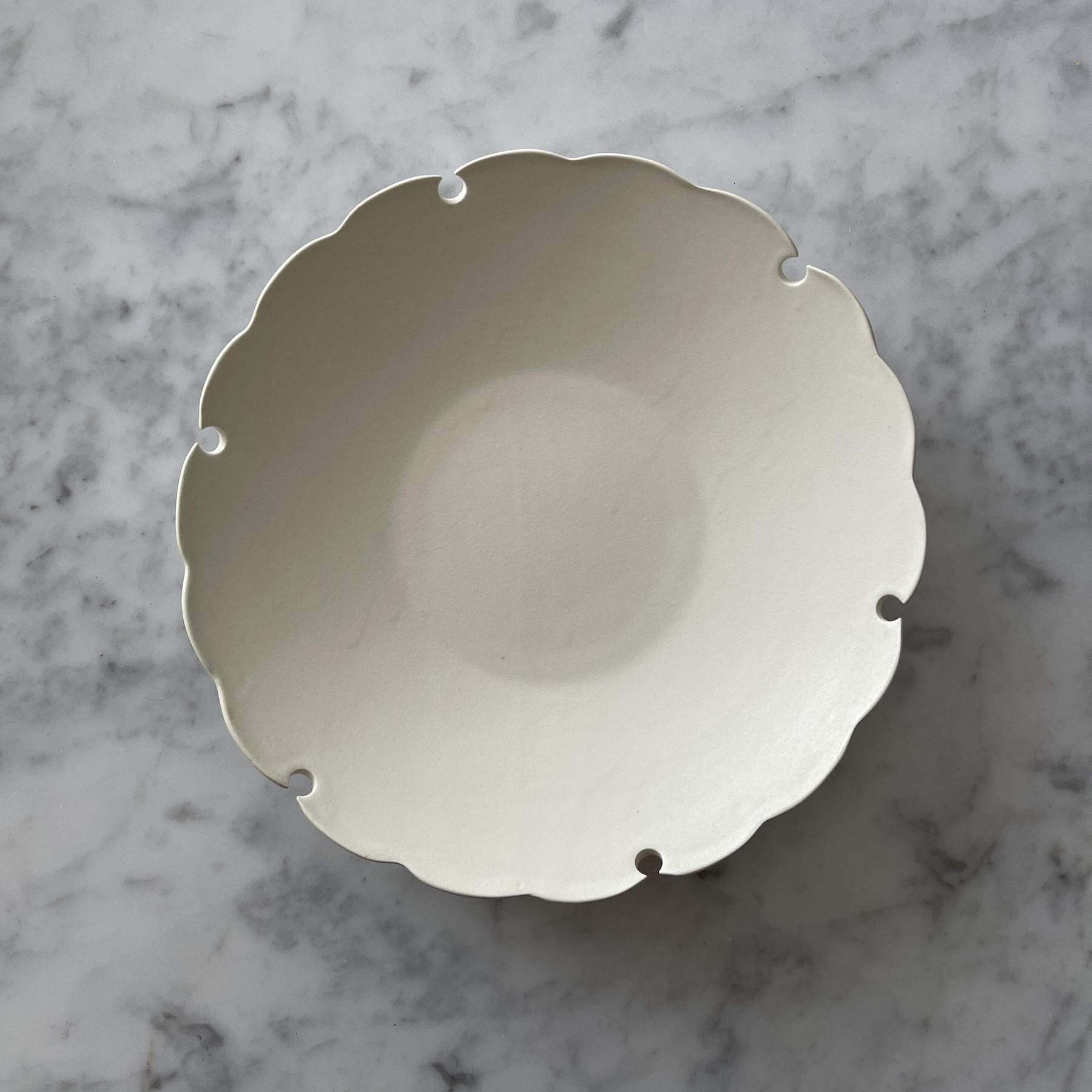 Elegant Yoshida Rinka Plate with scalloped design on marble background, part of the Yoshida Pottery Collection.
