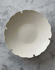 Elegant Yoshida Rinka Plate with scalloped design on marble background, part of the Yoshida Pottery Collection.