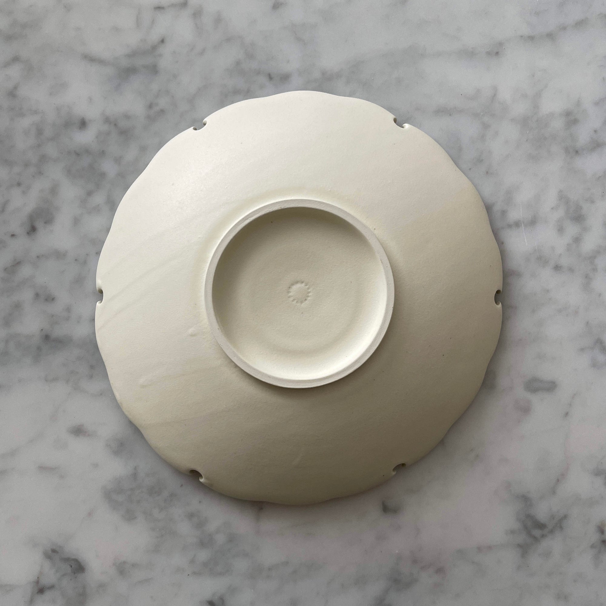 Yukiwa Plate by Yoshida Pottery, elegant ceramic plate inspired by nature, crafted by ceramist Masakazu Yoshida, on marble background.