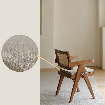 Chandigarh chair with teak wood and rattan, showcasing handwoven details, blending wabi-sabi design and Western minimalism.