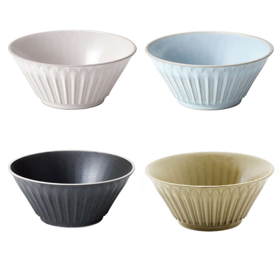 Four elegant Storia Bowls in white, blue, black, and beige porcelain with a textured design, evoking nostalgia and sophistication.